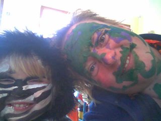 Hazel painted my face purple and green, I painted hers to match her zebra-print coat